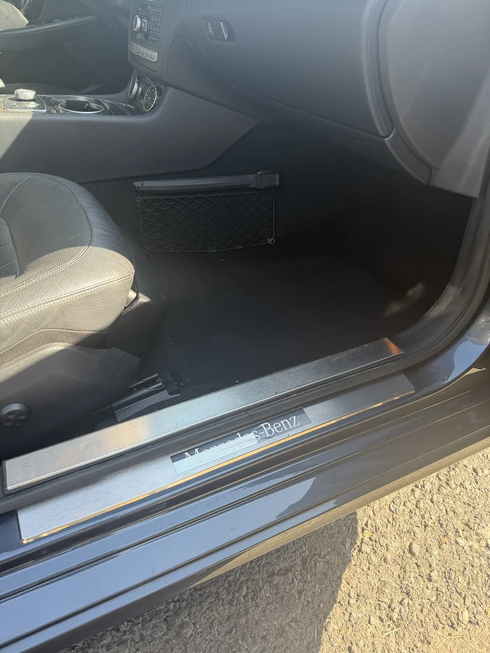 Mercedes-Benz CLS 550 passenger footwell before detailing